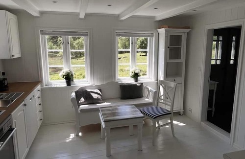 Lindesnes Haus | Holiday home Loneperle, new from summer 2023 ! in Lonestrand near Lindesnes-Furuholmen, southern Norway, sunny, spacious property with its own lake 'Lonetjønna' at the house, chic fully restored cottage for 6 people, tastefully furnished, 3 bedro.