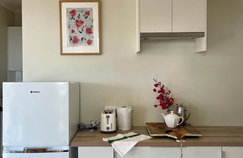 Duncan Sonstige | Large beachside Homestead, private apartments, fireplace, 3 min walk to beach.n