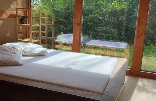 Huy Haus | Tiny house in a large natural garden