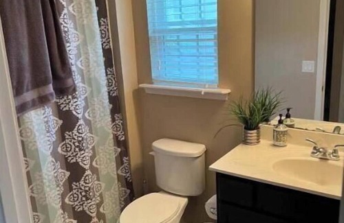 OakLeaf Plantation Haus | Restful private suite on golf course