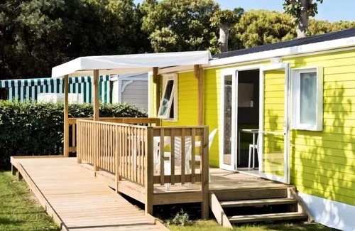 Saint-Cricq Haus | Camping Lac de Thoux* - Classic Pavilion 30m² - 3 Ad + 1 Child - for people with reduced mobility - air conditioning - TV 4 people