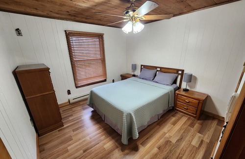 Lake Haus | Blissful Bluff Lake Retreat: 4BR House with Sandy Beach & Walkout Basement