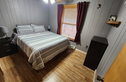 Lake Haus | Blissful Bluff Lake Retreat: 4BR House with Sandy Beach & Walkout Basement