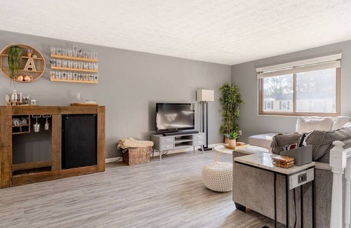 Columbus Haus | Newly remodeled home, spacious deck w/ string lights, & large yard with firepit