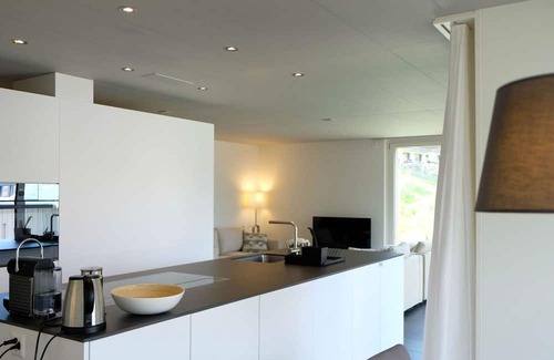 Spiez Wohnung | Nice apartment for 4 guests with WIFI, TV, balcony and parking