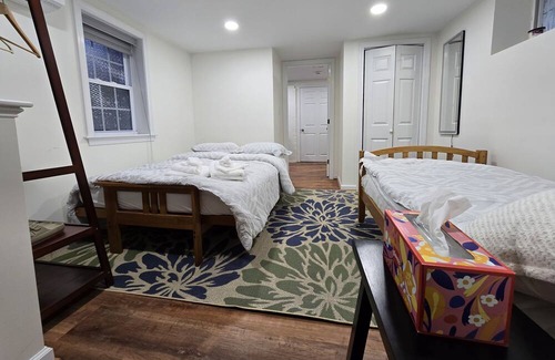 Mid-Cambridge Haus | Harvard Square Garden apartment w/ parking and laundry sleeps 4.