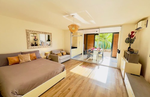 Tahiti Wohnung | Cozy apartment steps away from the beach, supermarket, and bakery.