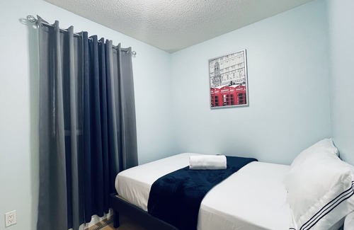 Slave Lake Haus | Modern Upper Level Duplex House Beside Convenience Store and Gasoline Station