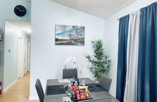 Slave Lake Haus | Modern Upper Level Duplex House Beside Convenience Store and Gasoline Station