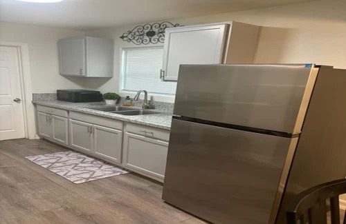 Sanger Haus | Kick back and relax in this cozy, stylish space.