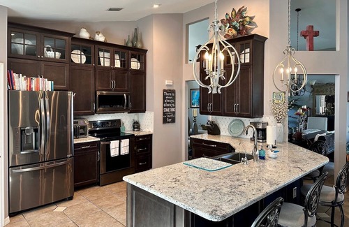 Boyette Springs Haus | Beautiful 40 ft Pool/Spa Home with Private Gym & Dedicated Office on Lake