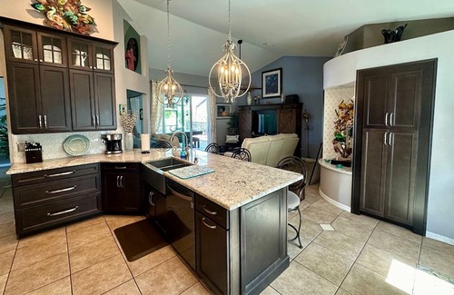 Boyette Springs Haus | Beautiful 40 ft Pool/Spa Home with Private Gym & Dedicated Office on Lake