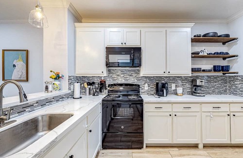 Seven Coves Haus | Elegant lakefront escape with private balcony, W/D, & gorgeous lake views
