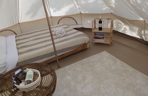 Arpino Haus | 12 m2 tent equipped with a comfortable French double bed, with an internal space to relax in. The ex
