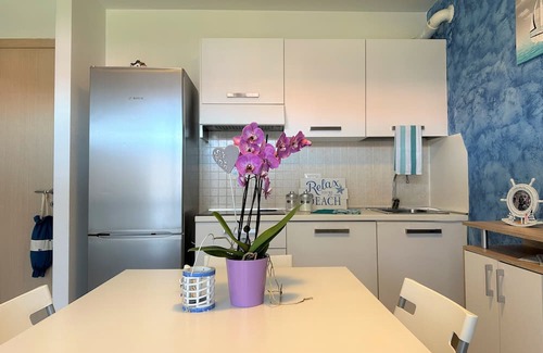 Aprilia Marittima Wohnung | Flat in a colourful residence with pool
