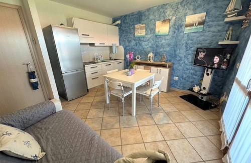 Aprilia Marittima Wohnung | Flat in a colourful residence with pool