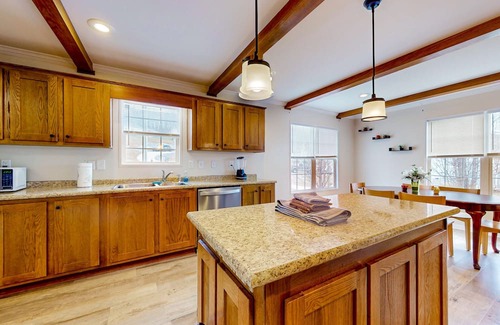 Dandridge Haus | Sunny dog-friendly home with a pool, balcony, smart TVs, washer/dryer, & AC