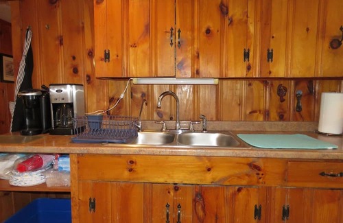 Sanford Hütte | Enchanting waterfront home offers comfort inside and out and promises enjoyment