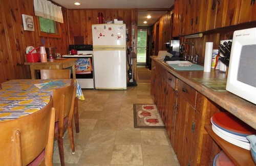 Sanford Hütte | Enchanting waterfront home offers comfort inside and out and promises enjoyment