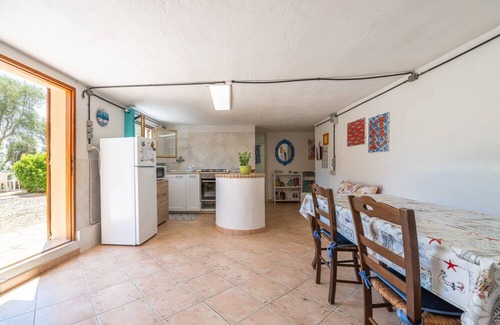 Sant'Antioco Haus | Holiday Home 'Fronte Mare Azzurro' with Sea View, Shared Garden and Wi-Fi
