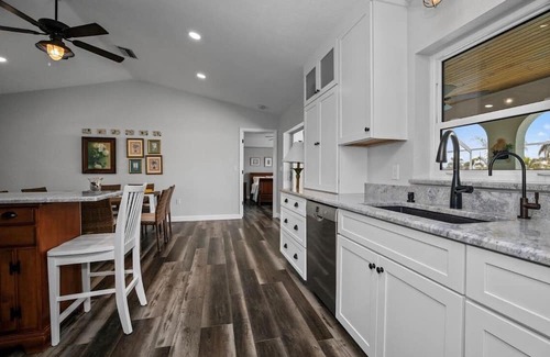 Harbour Heights Haus | Paradise Awaits. Beautiful Home with Pool located on a canal with dock