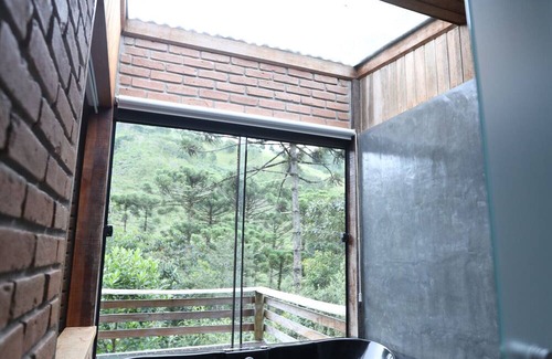 Maromba Haus | Refuge in Itatiaia with hydromassage | Chalé Tijolinho