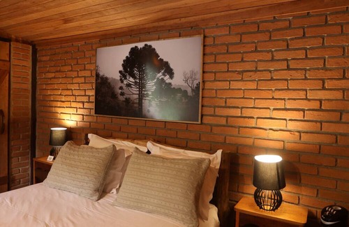 Maromba Haus | Refuge in Itatiaia with hydromassage | Chalé Tijolinho