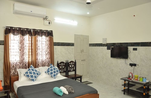 Thanjavur Haus | Roof-top stay in a new-built house in the centre of city.