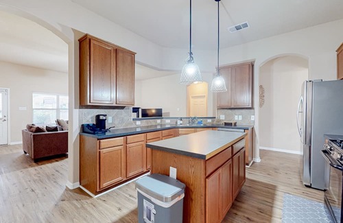 Speyside Haus | Northeast Austin home with enclosed yard, single-story interior, AC, & W/D