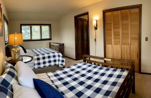 Cadillac Hütte | Cozy, yet spacious, Lakefront Cottage with perfect blend of modern and vintage.