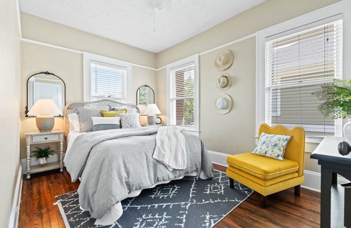 Five Points Haus | Remodeled charmer with work desk, enclosed yard, front porch, & chef's kitchen