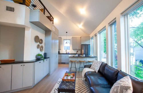 North Loop Haus | Stylish 3 story house. 3 patios. Central Austin.