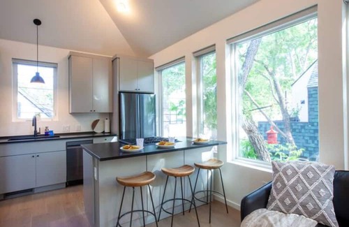 North Loop Haus | Stylish 3 story house. 3 patios. Central Austin.