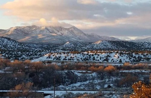 Cerrillos Haus | Romantic, Rock Carriage House, Hot Tub, WoodStove, on Historic Property