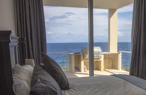Bouvet Island Haus | Stunning 3 bdrm oceanfront home w/ Infinity Pool in exclusive Lighthouse Estates