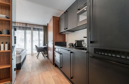 Kirchberg in Tirol Wohnung | Cosy apartment for 4 guests with WIFI, pool, TV and terrace