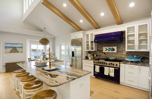 Palm Harbor Haus | Luxurious waterfront home w/pool, hot tub, game room, dock & water activities