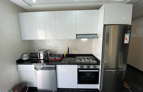 Taddart Wohnung | Modern, well-equipped new apartment, 15-minute drive from Agadir Marina.