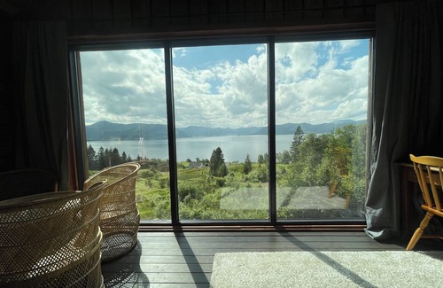Fiskabygd Kabine | Stunning fiord panorama view off-grid forest cabin