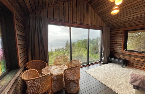 Fiskabygd Kabine | Stunning fiord panorama view off-grid forest cabin