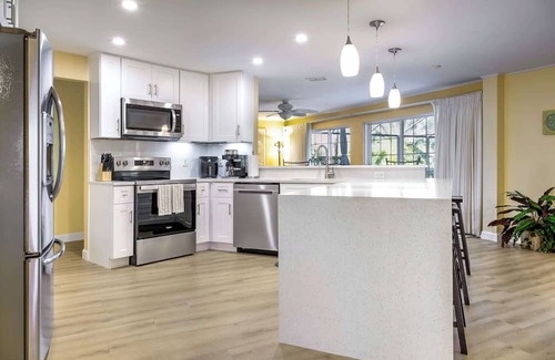 Lochmoor Waterway Estates Haus | ‼️Family-Ready‼️ 4BR with Heated Pool & BBQ