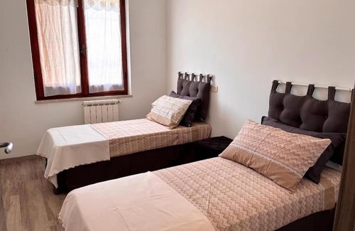 Magomadas Wohnung | Bosa Apartment large terrace with a view