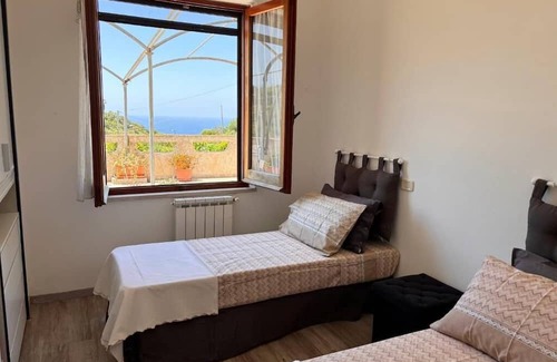 Magomadas Wohnung | Bosa Apartment large terrace with a view