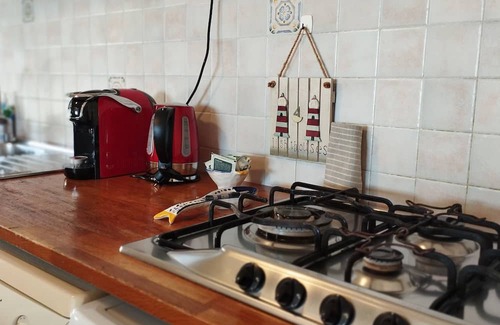 Anzio Wohnung | Penthouse overlooking the rooftops of Anzio's historic buildings, downtown but within walking distance of the beach.