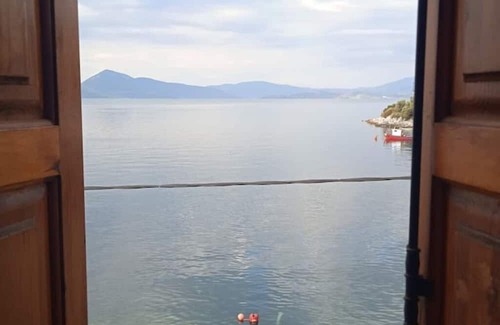 Trikeri Haus | Seaside Tower House: A Traditional Retreat with Breathtaking Views