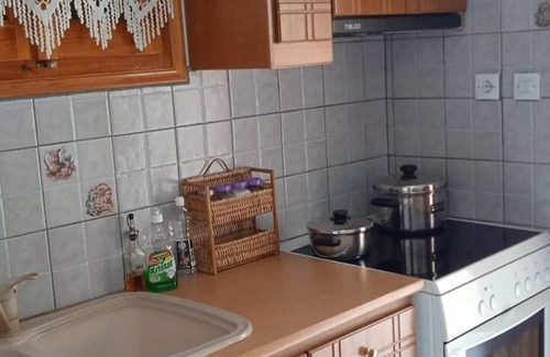 Trikeri Haus | Seaside Tower House: A Traditional Retreat with Breathtaking Views