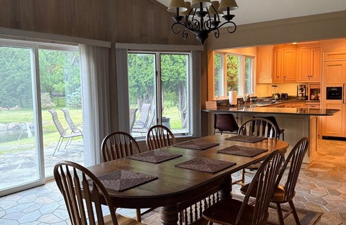 Lakeside Haus | Private Flathead Lake lagoon and dock, enjoy a spacious 5-bedroom Lakeside home.