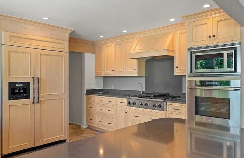 Lakeside Haus | Private Flathead Lake lagoon and dock, enjoy a spacious 5-bedroom Lakeside home.