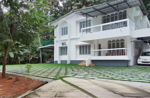 Kottayam Haus | Genesis spaces AC upto 4 guests Kottayam