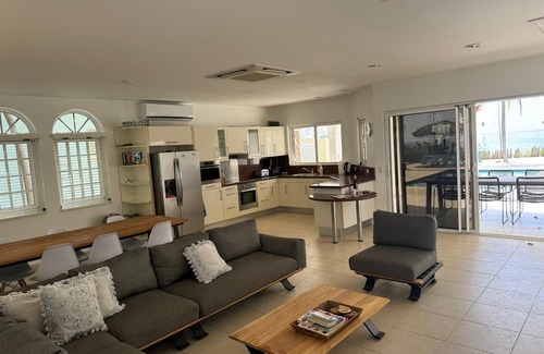 Sabadeco Haus | Crown Ridge 12 – Oceanfront home with private pool & infant of a dive site